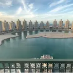 Beachfront Luxury Apartment-Pearl Island شقه مطله على الشاطئ بجزيرة اللؤلؤه